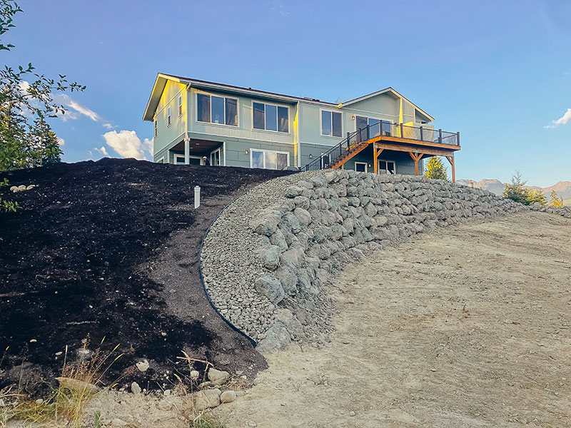 hillside retaining wall erosion control at new home